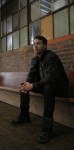 Sitting on bench, factory